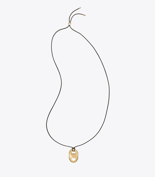 Tory Burch Gemini Pendant Necklace - Light Brass / Black